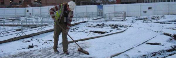 Haver Lane, Hungate in York being cleaned of snow by dig supervisor Arran. Competition winning image.